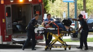 An injured woman is taken into Broward Health Trauma Center in Fort Lauderdale  Fla   after a shooting at the Fort Lauderdale-Hollywood International Airport on Friday  Jan  6  2017  Authorities say a lone shooter opened fire at the airport Friday afternoon  killing  multiple  people before he was taken into custody   Taimy Alvarez South Florida Sun-Sentinel via AP
